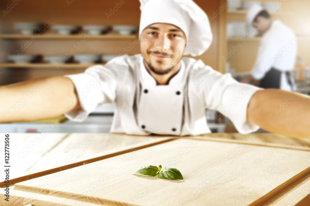 cook chef making selfie and wooden top place cook chef making selfie and wooden top place
