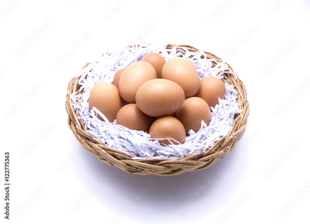 Brown eggs in basket with recycle paper Brown eggs in basket with recycle paper
