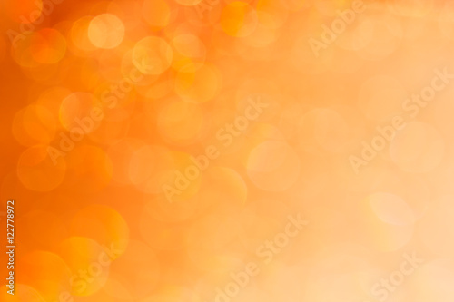 Christmas bokeh background. Golden background with blurred lights.