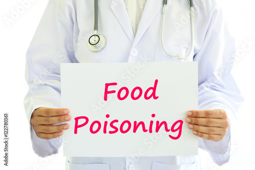 Doctor holding Food poisoning card in hands photo
