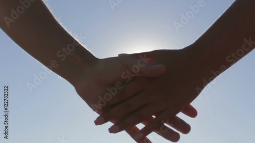 Couple on a date holding hands solar flare