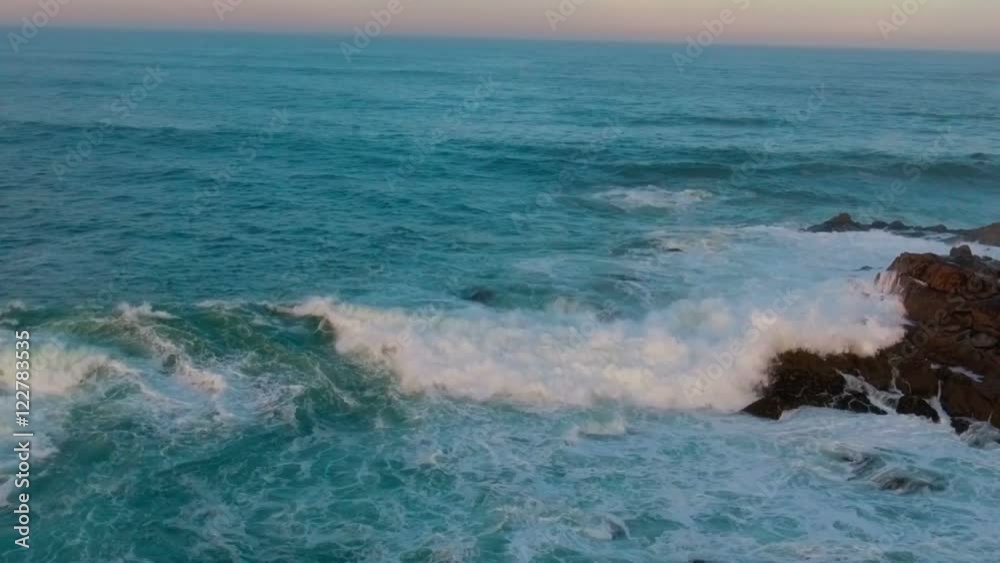 Ocean waves sea spray foam sunset sky slow motion Ocean waves sea spray foam sunset sky slow motion