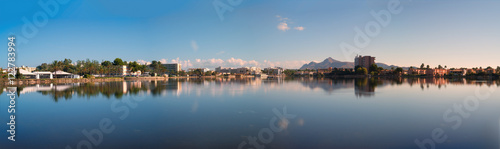hotels is reflected in the Esperanza lake in Port d'Alcudia. Beautiful reflection of the sky and clouds. Alcudia, Mallorca, Spain. © luchschenF