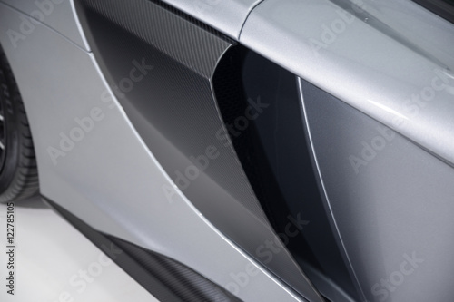Carbon fibre side panel on sports car