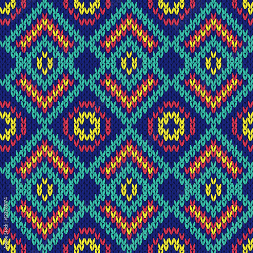 Ornate ethnic knitting motley seamless pattern mainly in blue hu