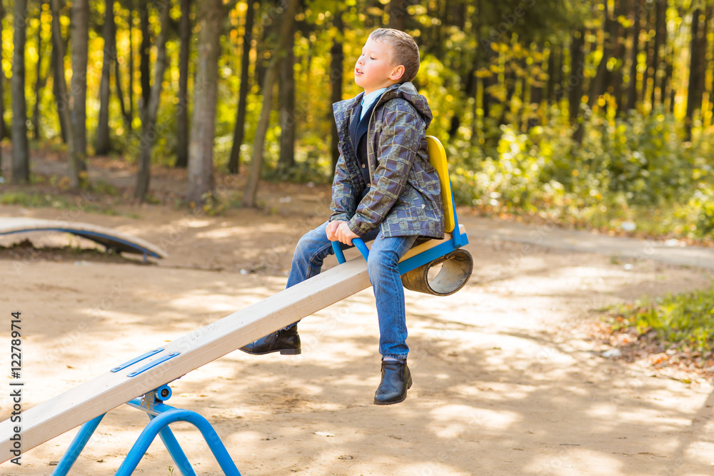 Children Playing On A School Playground During Recess Stock Photo children-playing-on-a-school-playground-during-recess-stock-photo