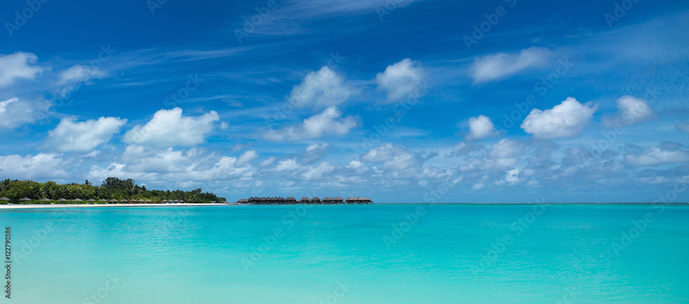 Perfect tropical island paradise beach Maldives, panorama format