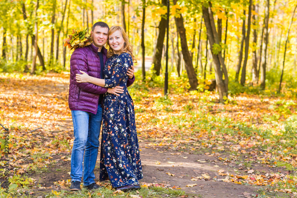 love, relationship, family and people concept - couple in autumn park love, relationship, family and people concept - couple in autumn park