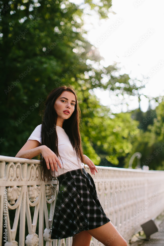 Naklejka premium Attractive girl posing outdoor