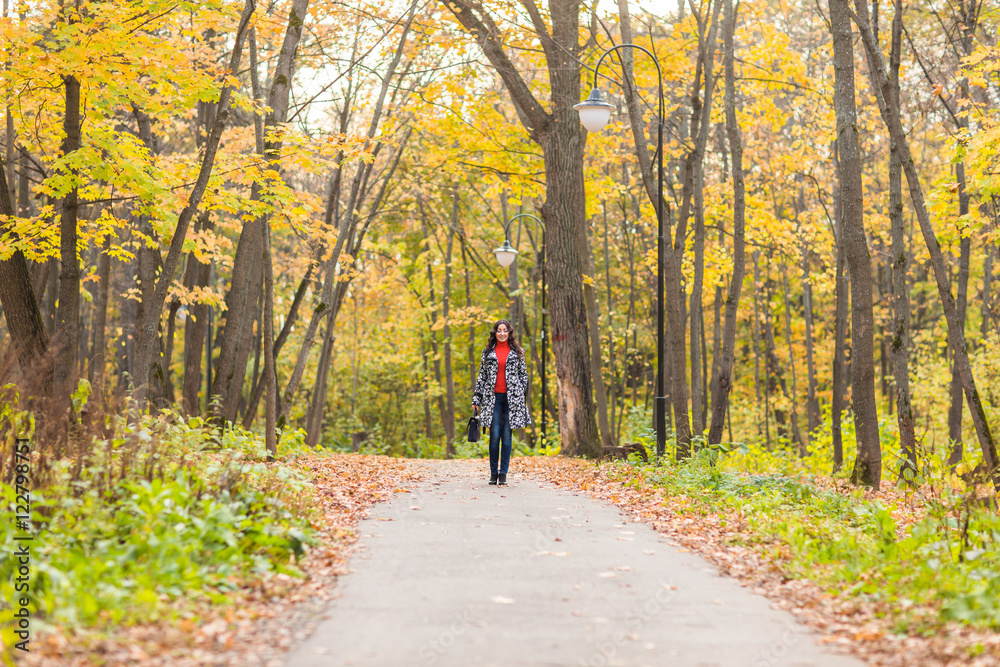 Pretty young student girl in autumn outdoor. Pretty young student girl in autumn outdoor.