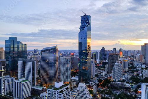 Cityscape from a high angle in Silom area, with Mahanakhon, which is a new building with a highest in Thailand, Bangkok, Thailand, Sunset sky