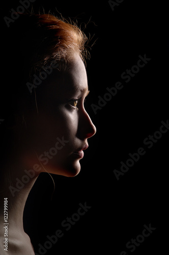 profile of young pensive woman
