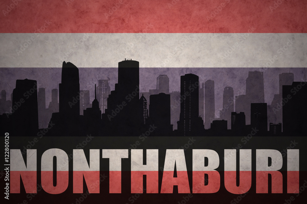 abstract silhouette of the city with text Nonthaburi at the vintage thailand flag background