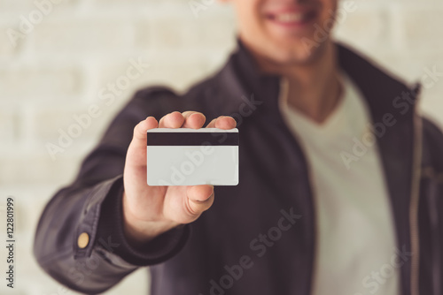 Handsome guy with credit card