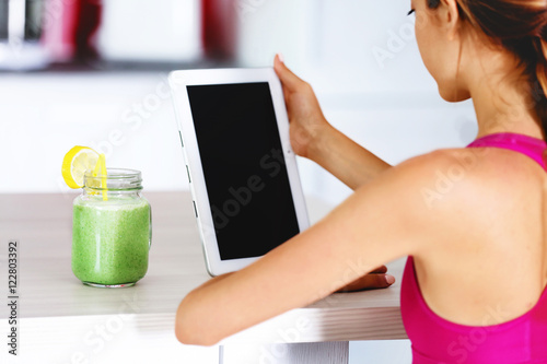 Girl with tablet and smooth...