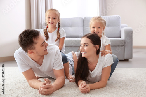 Happy parents with daughter...