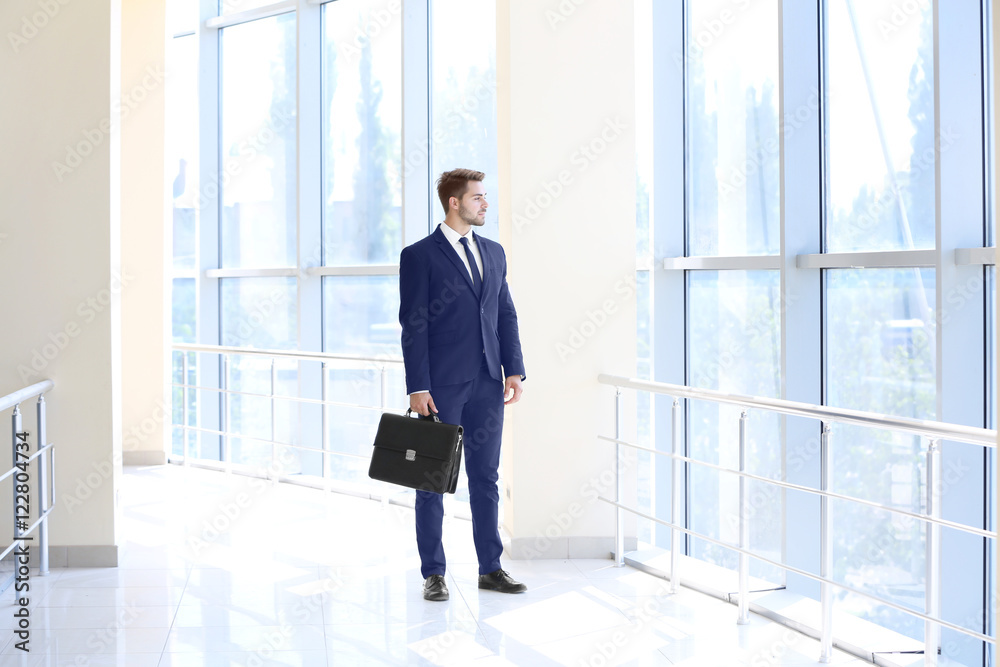 Handsome young lawyer  at office building