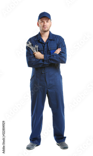 Young mechanic in uniform w...