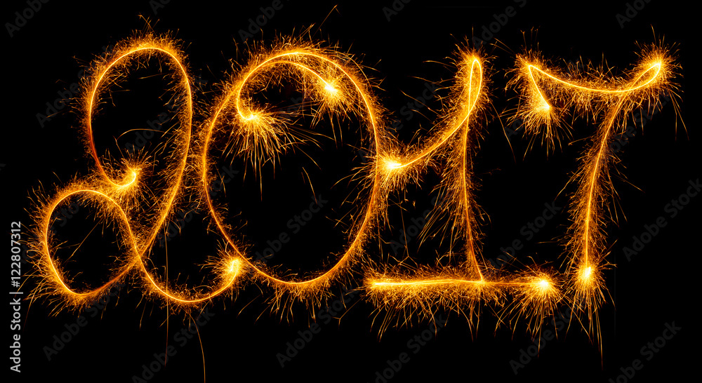 Happy New Year - 2017 with sparklers on black Happy New Year - 2017 with sparklers on black
