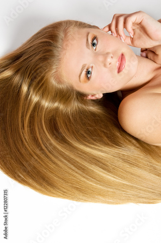 Blond Hair.Beautiful Woman with Straight Long Hair