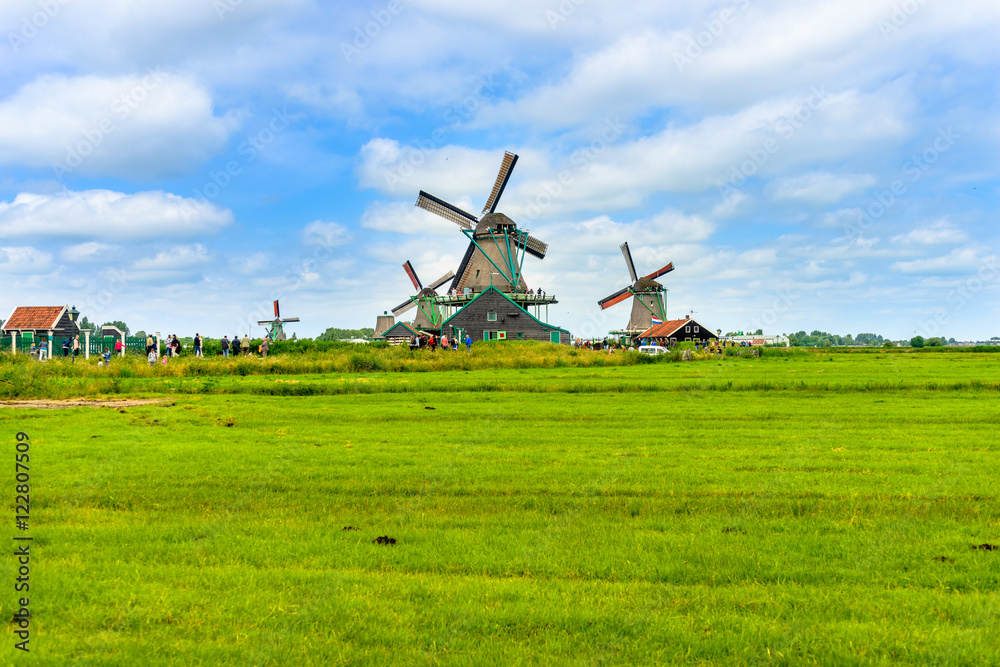 Fototapeta premium Traditional windmills on farm during summer