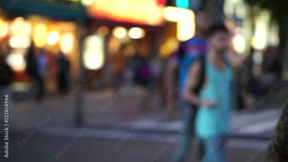 Crowds of Japanese and tourist at night walking at Takeshita street, Harajuku, Tokyo, Japan. 