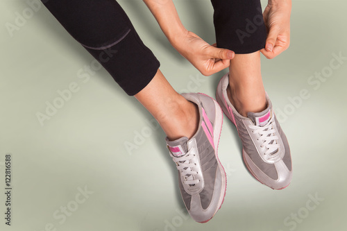 Sports background. Runner feet running closeup on shoe.