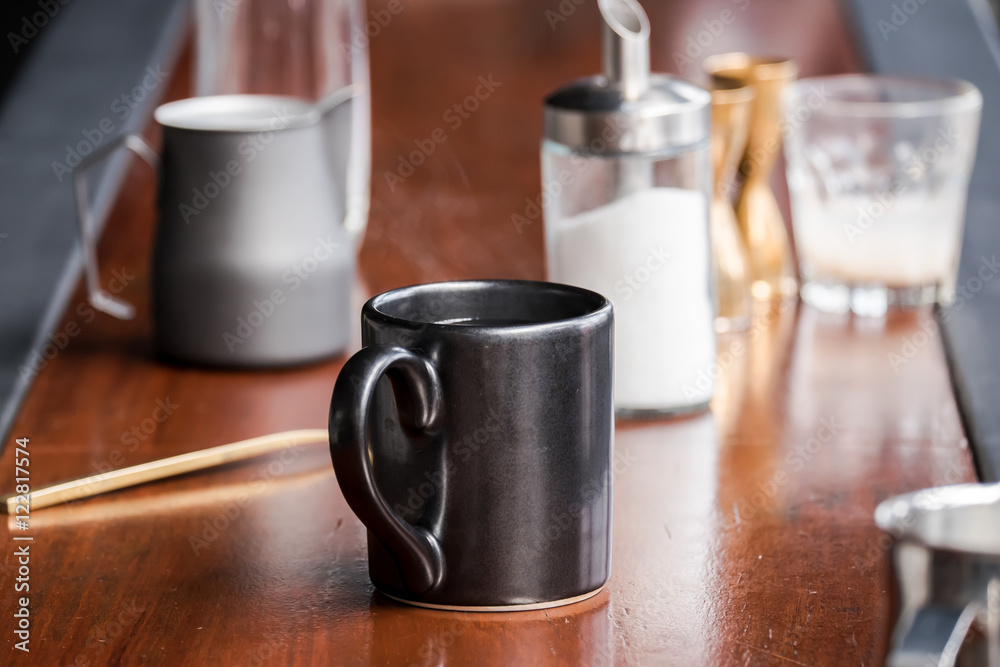 Black cup of hot water Black cup of hot water
