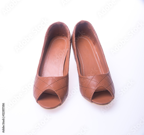 shoe. Brown colour fashion woman shoes on a background.