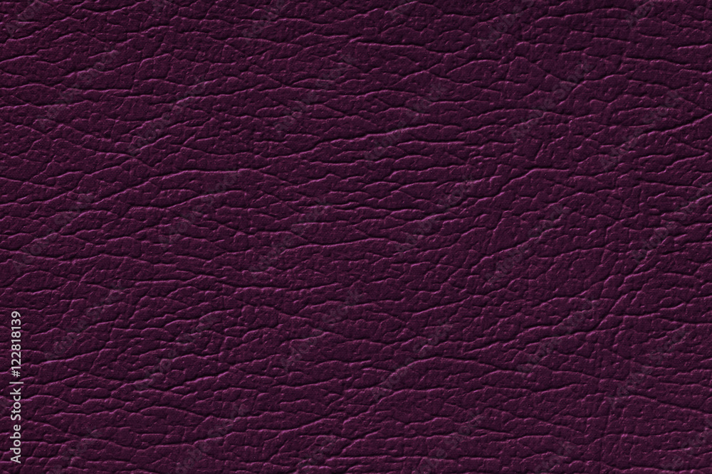 Dark purple leather texture background with pattern, closeup Dark purple leather texture background with pattern, closeup