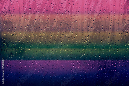 Wallpaper Mural Rain drop on glass window with Rainbow Gradient Color, Gay Pride Background concept Torontodigital.ca