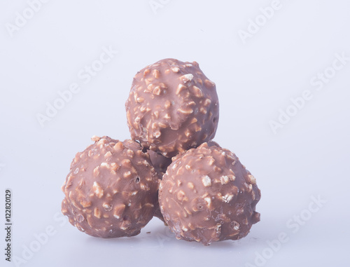 chocolate ball or chocolate bonbon on a background.