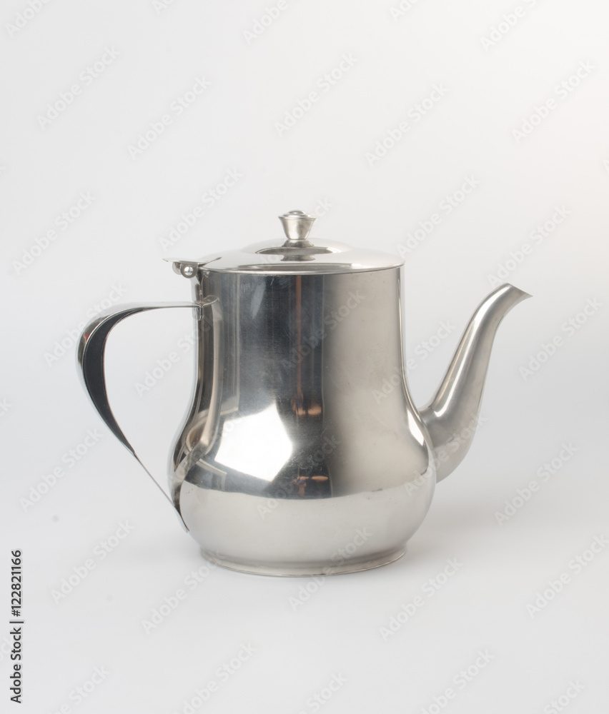 tea pots or stainless steel tea pots on the background. tea pots or stainless steel tea pots on the background.