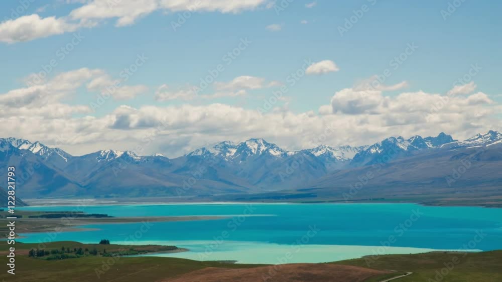 Time Lapse - Ariel View of Lake Tekapo with Mountain Range Time Lapse - Ariel View of Lake Tekapo with Mountain Range
