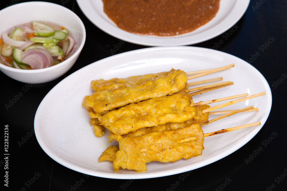 Pork satay,Grilled pork with peanut sweet sauce and sour sauce o