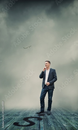 Businessman Standing and Thinking About Future Business Plans