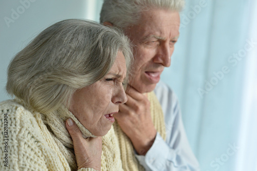 Portrait of sick elderly couple