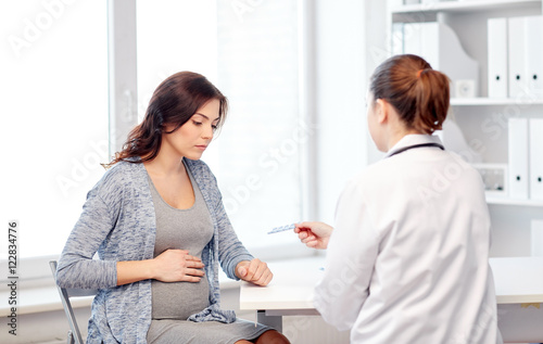 gynecologist doctor and pregnant woman at hospital