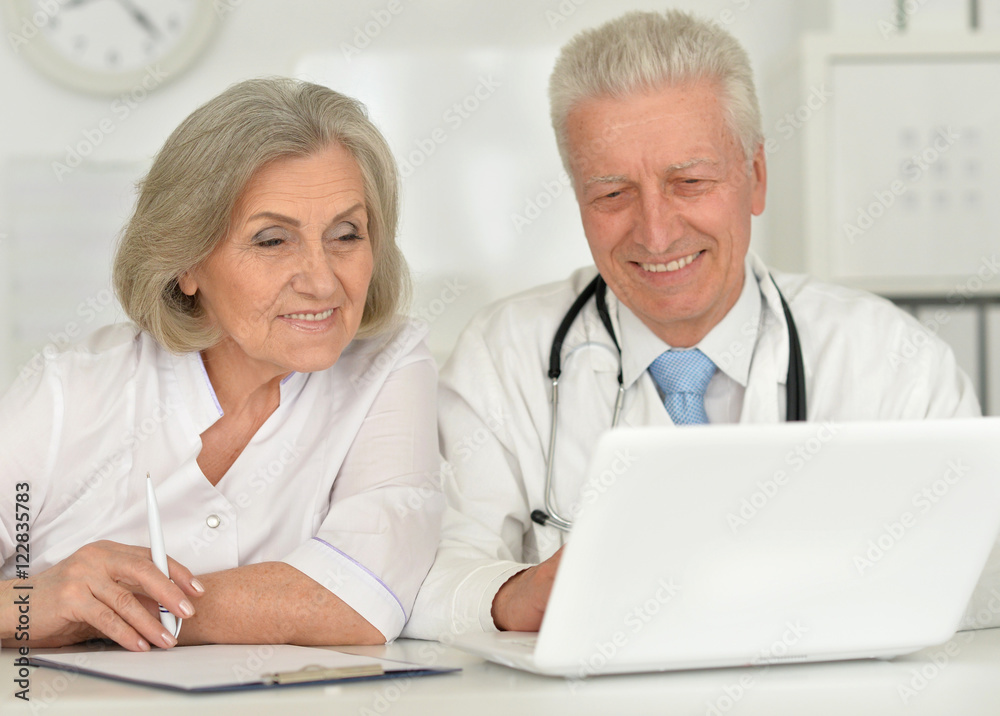 senior Doctors with laptop senior Doctors with laptop
