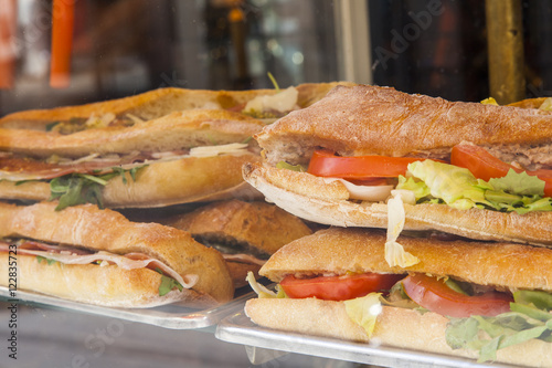  Appetizing sandwiches on a show-window in cafe