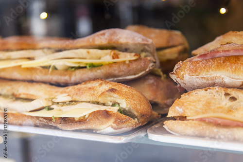  Appetizing sandwiches on a show-window in cafe