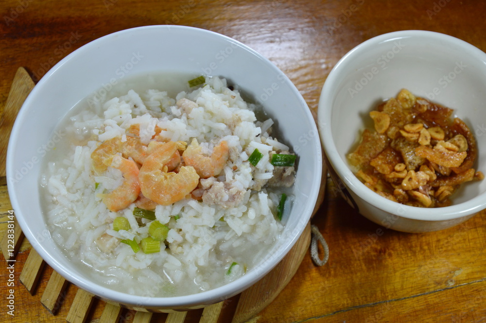 rice porridge minced pork and dried shrimp with fried garlic on bowl rice porridge minced pork and dried shrimp with fried garlic on bowl