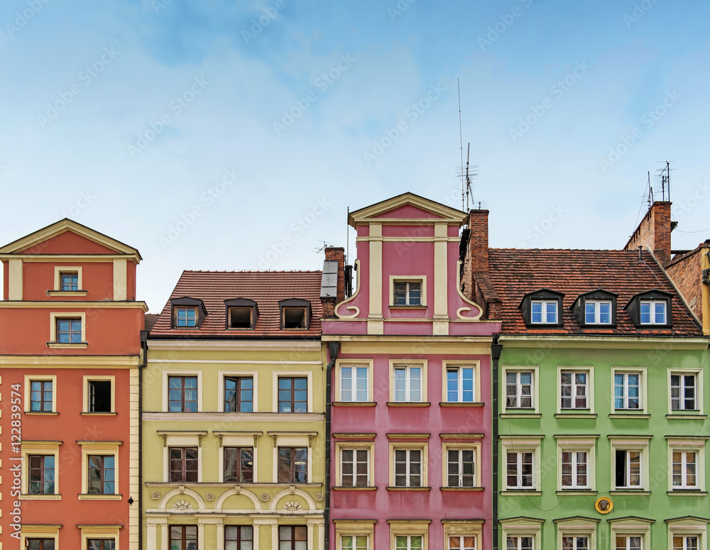 cute colorful houses in a row. old european city market square houses on it, Wroclaw Poland