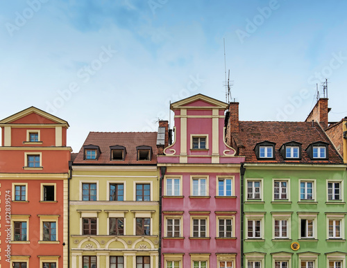 cute colorful houses in a row. old european city market square houses on it, Wroclaw Poland