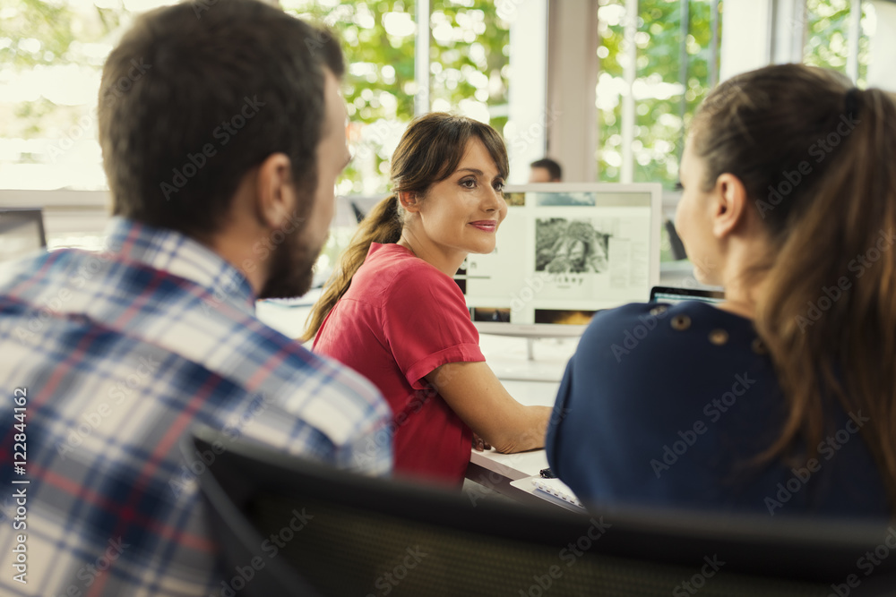 Business team working on graphic data concept. Business team working on graphic data concept.