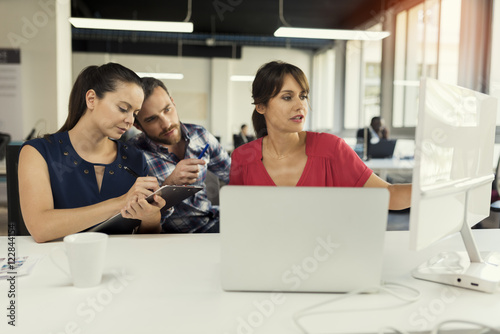 Office team. Group of people in business meeting in startup © ldprod