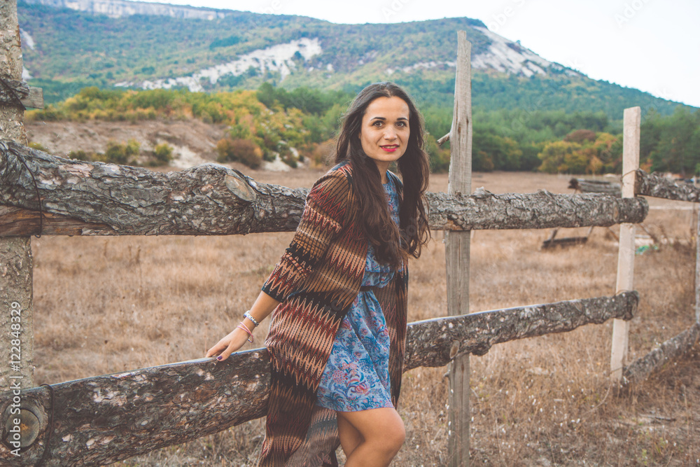 Fototapeta premium Woman is wearing clothes in bohemian style