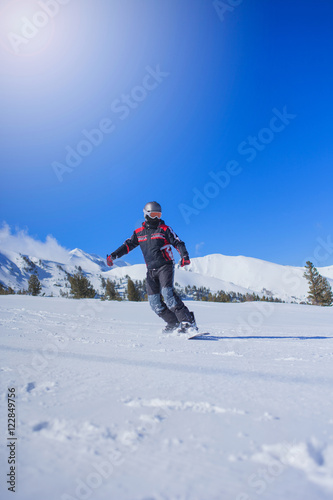 extreme sport,snowboarder in action at the mountains