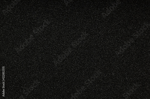Black monotone grain texture. Glitter sand background.