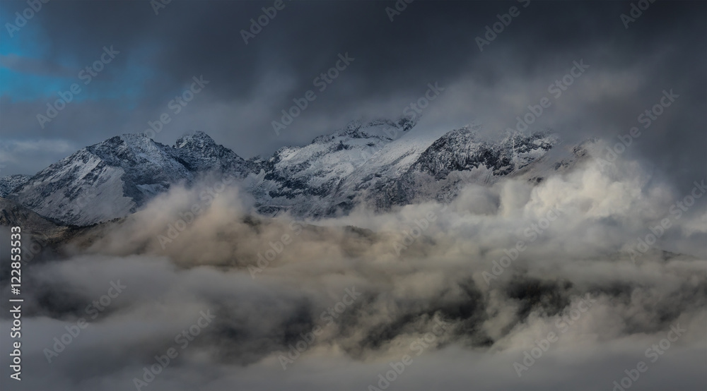 Birth of clouds high in  Caucasus Mountains on a foggy morning.